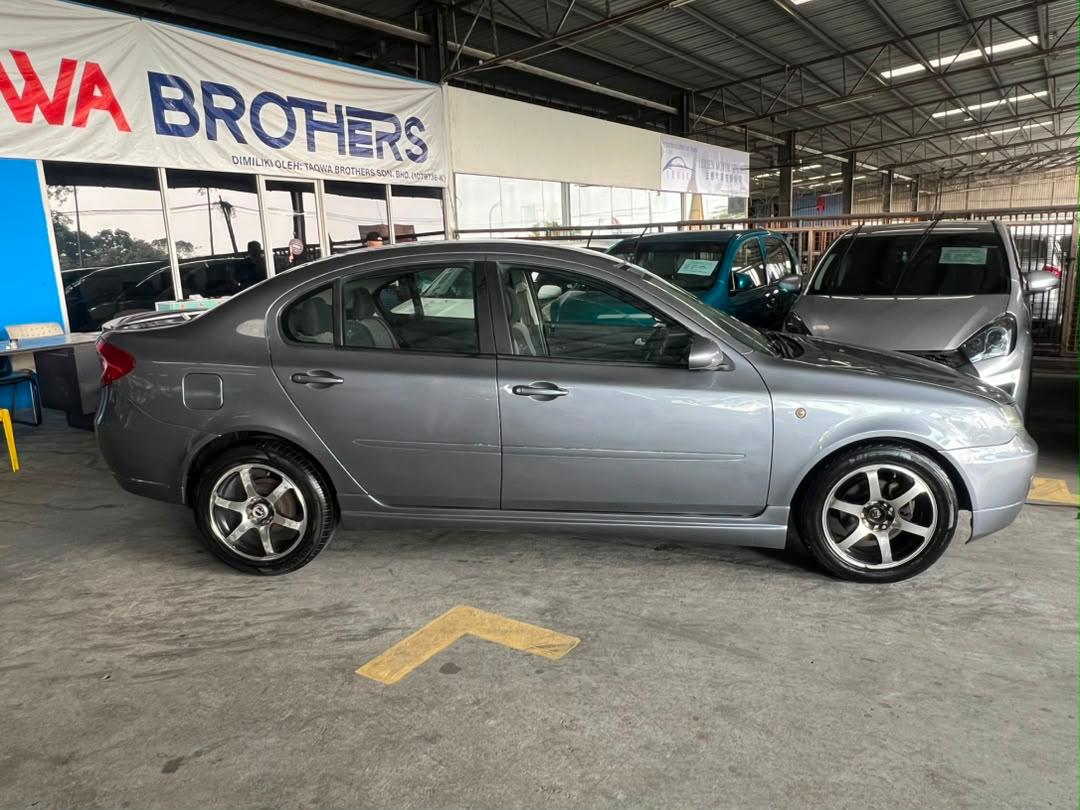 
								JLG 1327 PROTON PERSONA 1.6 AUTO full									